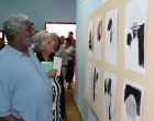 Victor-Fowler-Director-del-Centro-Cultural-Dulce-María-Loynaz-y-Nidia-Mora-madre-del-intelectual-cubano-Rufo-Caballero-aprecian-la-obra-de-Sancho